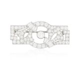 AN ART DECO DIAMOND BROOCH, CIRCA 1930 Of openwork geometric design with foliate detailing,