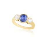 A SAPPHIRE AND DIAMOND DRESS RING, BY RABINO The oval-shaped sapphire between brilliant-cut