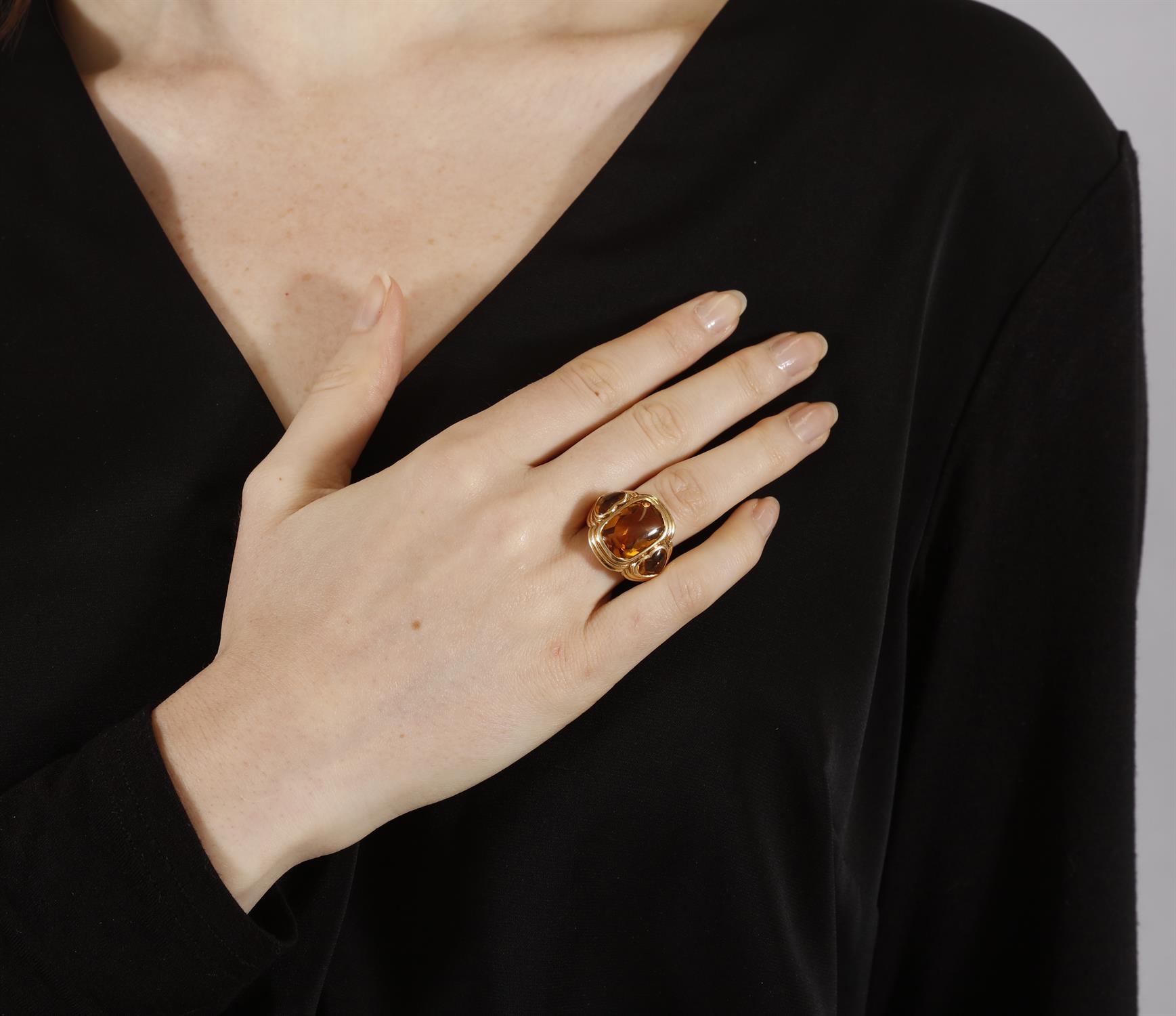 A CITRINE DRESS RING, BY REPOSSI The faceted top cabochon cushion-shaped citrine between two - Image 4 of 5