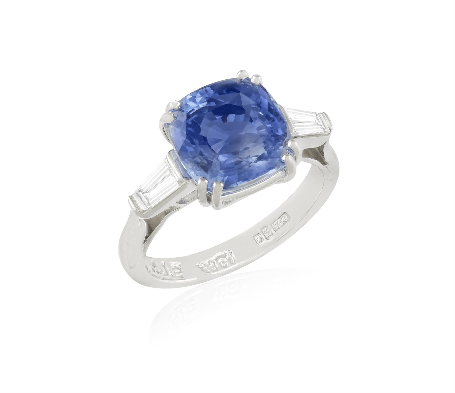 A SAPPHIRE AND DIAMOND DRESS RING The cushion-shaped sapphire weighing approximately 5. - Image 2 of 6