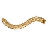 A MID-20TH CENTURY GOLD BRACELET, the openwork articulated design, with a series of interlocking