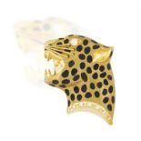 AN 18K GOLD AND DIAMOND BROOCH, depicting the profile of a roaring leopard, the eye embellished