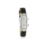 A STAINLESS STEEL AND DIAMOND-SET DUAL-TIME ZONE 'TESLAR' WRISTWATCH, BY PHILIP STEIN,