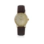 A 14K GOLD MANUAL WIND WRISTWATCH, BY OMEGA, CIRCA 1950, the circular cream dial with Roman '12',