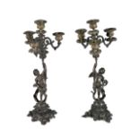 A PAIR OF VICTORIAN SPELTER FIGURAL CANDELABRA stamped F. Souchal, Paris