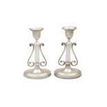 A PAIR OF SILVER CANDLESTICKS London c.1906, mark of Harrison Bros & Howson, each with