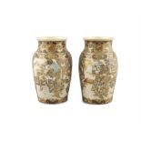 A PAIR OF JAPANESE EARTHENWARE SATSUMA VASES Each of baluster form, decorated with a continuous