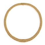 A MID-20TH CENTURY GOLD NECKLACE, FRENCH, of openwork design with a series of graduated