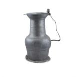 A LARGE PEWTER FLAGAN, 19th century, of baluster form, the plain body with wavy handles,