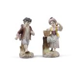 A PAIR OF CAPODIMONTE PORCELAIN FIGURES, of a boy and girl fruit sellers, in 18th Century attire,