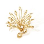 A DIAMOND BROOCH, the openwork foliate design highlighted with old brilliant, cushion and
