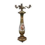 A 19TH CENTURY PORCELAIN AND ORMOLU MOUNTED OIL LAMP Of baluster form with four branch light