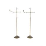 A PAIR OF BRASS ANGLOPOISE STANDARD LAMPS Each with loop brass handle and adjustable candle arm