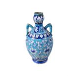 AN INDIAN 'IZNIK' BLUE AND WHITE GOURD VASE, 19TH CENTURY of ovoid shape, painted to the body
