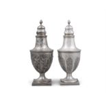 A PAIR OF GEORGE IV SILVER MUFFINEERS/CASTORS London c.1802, maker's mark 'AD', of urn form,