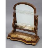 A 19th century mahogany rectangular swing toilet mirror on pierced & shaped end supports, & with two