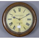 A 19th century wall clock, with black Roman numerals to the 9½” diam. cream enamel painted dial