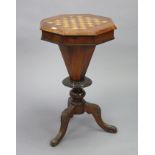 A Victorian walnut needlework table inset chess-board to the octagonal lift-top & an octagonal