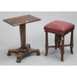 A late Victorian beech stool with a padded revolving square seat, & on four ring-turned legs with