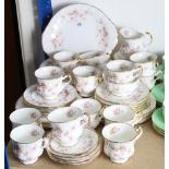 A Paragon bone china “Victoriana Rose” fifty-nine piece part dinner & tea service.