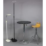 A chrome-plated & black-finish breakfast table, 23½” diameter x 35½” high; a similar bar stool, &