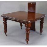 A Victorian-style mahogany extending dining table, with moulded edge & rounded corners to the