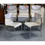 A set of twenty silvered-finish plywood & chrome-finish stacking chairs.