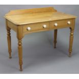 A Victorian pine side table fitted two frieze drawers, & on turned tapered legs, 42” wide x 28½”