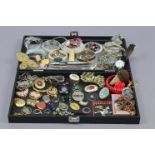 Various items of costume jewellery; & a black-finish jewellery case.