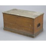 An early 20th century grained-pine blanket box with a hinged lift-lid & with wrought-iron side