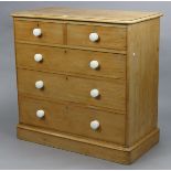 A Victorian pine chest fitted two short & three long graduated drawers with ceramic knob