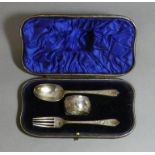 An Edwardian silver christening set of dog-nosed spoon & fork with engraved scroll decoration, &