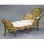 A carved giltwood frame lit-a-jour in the late 18th century style, with rounded cane-panel ends,