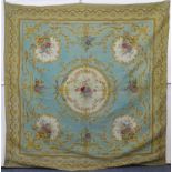 A 20th century French tapestry in the Aubusson style, of light blue ground with cream reserves of