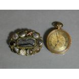 A late 19th/early 20th century ladies’ fob watch in floral-engraved 18K case, the engraved gilt dial