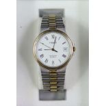A Tissot Seastar stainless steel gent’s wristwatch, the circular white dial with day aperture &