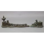 A 19th century cast brass fender in three sections with pierced scroll frieze, reclining putti and