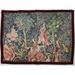 A 20th century Flemish style tapestry with allegorical scene of figures in a garden, with crimson