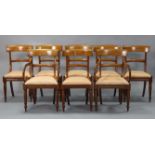 A set of eight Victorian bow-back dining chairs, including two carvers, with open scroll arms,