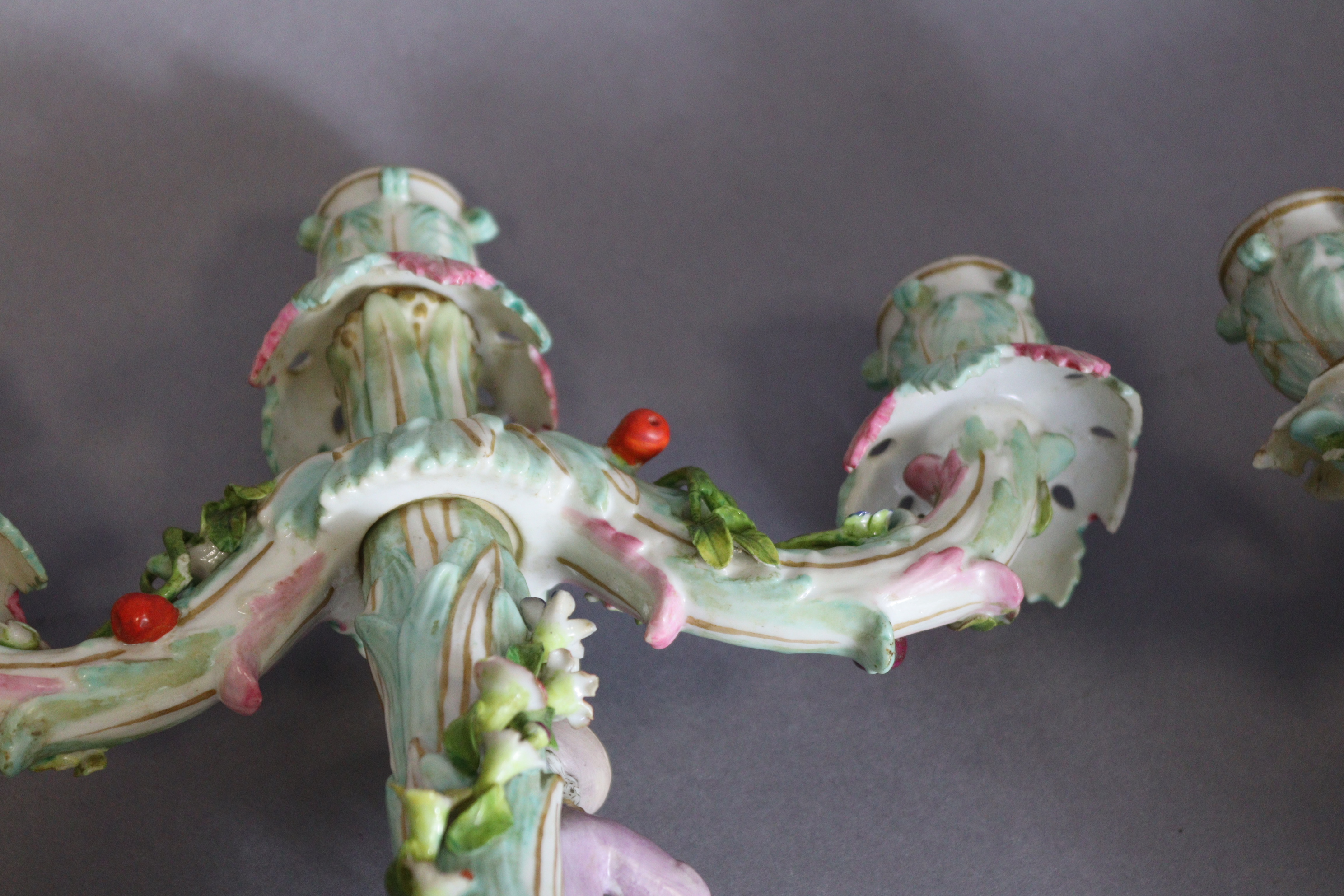 A pair of Meissen porcelain three-branch floral-encrusted candelabra, one with a girl holding a - Image 11 of 11