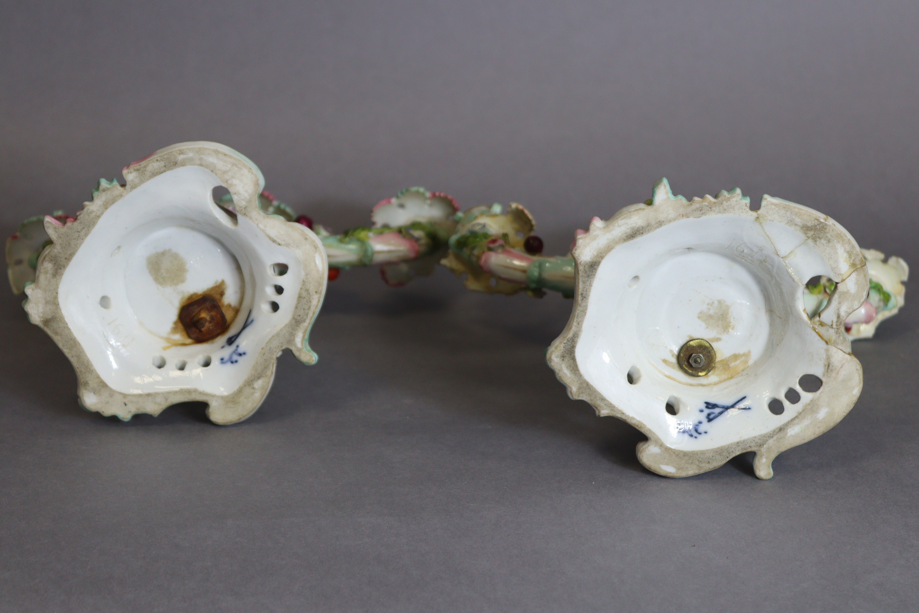 A pair of Meissen porcelain three-branch floral-encrusted candelabra, one with a girl holding a - Image 5 of 11