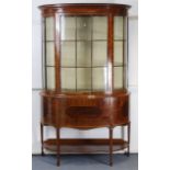 An Edwardian inlaid mahogany bow-front tall display cabinet, fitted two plate glass shelves to the