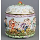 A Capo-di-Monte style porcelain cylindrical vessel & cover decorated in relief & coloured enamels
