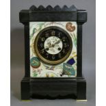 A Victorian aesthetic style mantel clock in black slate case, the ceramic face painted in coloured