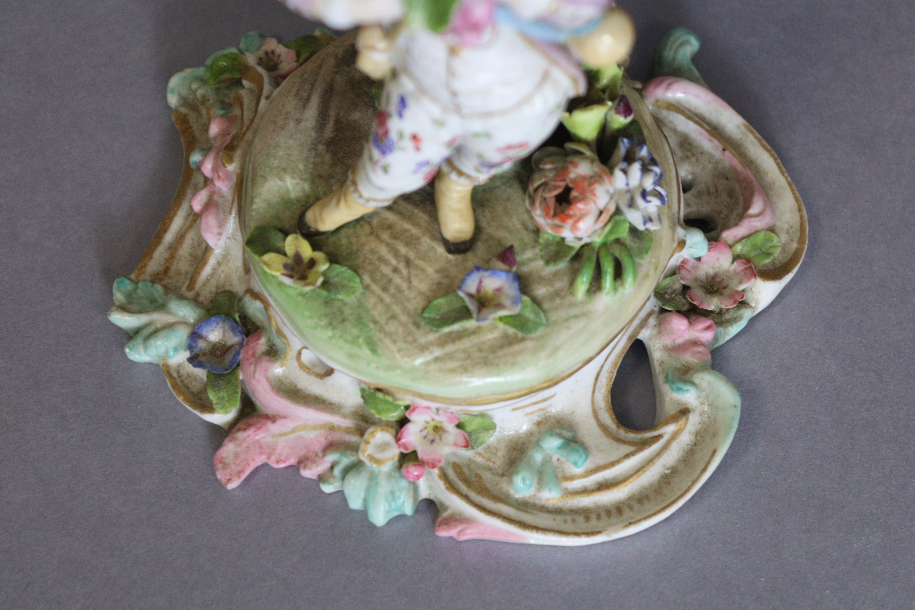 A pair of Meissen porcelain three-branch floral-encrusted candelabra, one with a girl holding a - Image 7 of 11