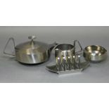 An Old Hall stainless steel three-piece tea set designed by Robert Welch comprising a teapot,