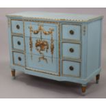 A Louis XV style blue painted break-front commode, fitted three drawers with gilt metal wreath