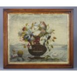 A MID-19th century LONGSTITCH WOOL NEEDLEWORK PICTURE of mixed flowers in a vase, 18½” x 23”, in