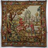 A 20th century French tapestry in the Aubusson style, with a hunting scene in floral borders; 52”