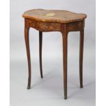 A French marquetry inlaid occasional table, the shaped top decorated with musical instruments &